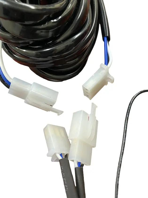Remote Relay and Strobe Controller wiring harness with white connectors and blue wires on Tampa Home & Garden Store