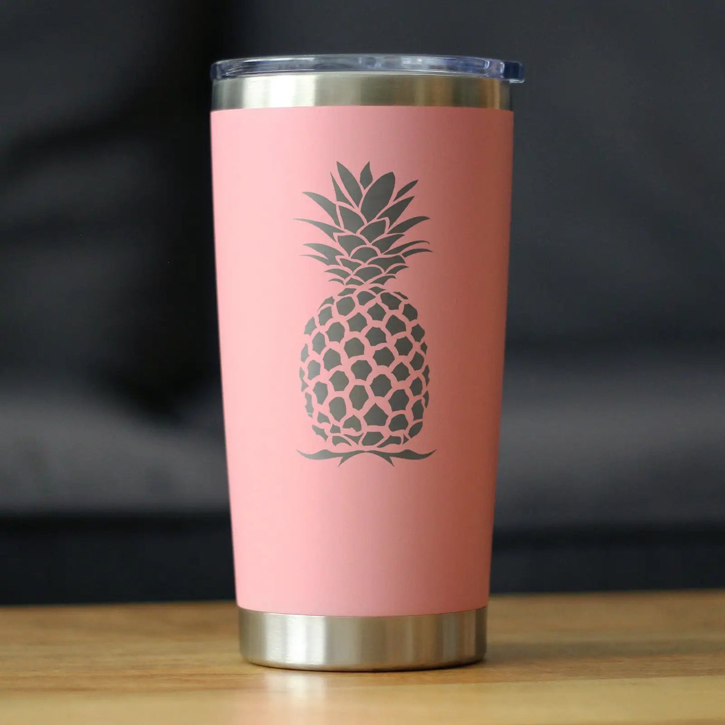 bevvee Pineapple 20 oz tumbler with lid, pink stainless steel body, gray pineapple graphic on Tampa Home & Garden Store