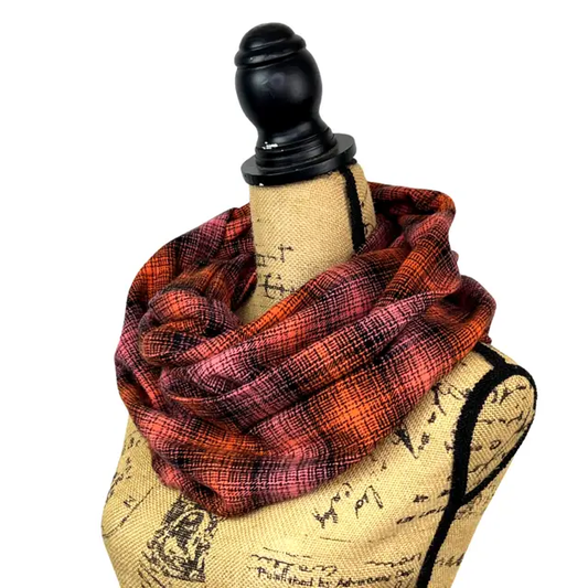 Thistle & Stitch pink orange ombre plaid flannel scarf wrapped around mannequin on Tampa Home & Garden Store