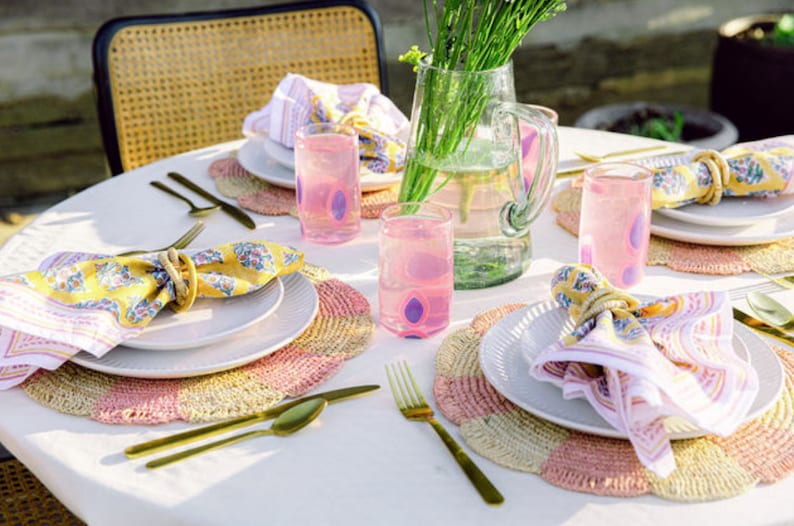 Pinwheel Pink Placemat, raffia tabletop - Tampa Home & Garden Store