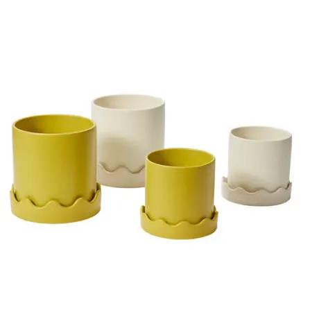 Pissaro plant pot set, 4-piece yellow and ivory pots with scalloped bases on Tampa Home & Garden Store
