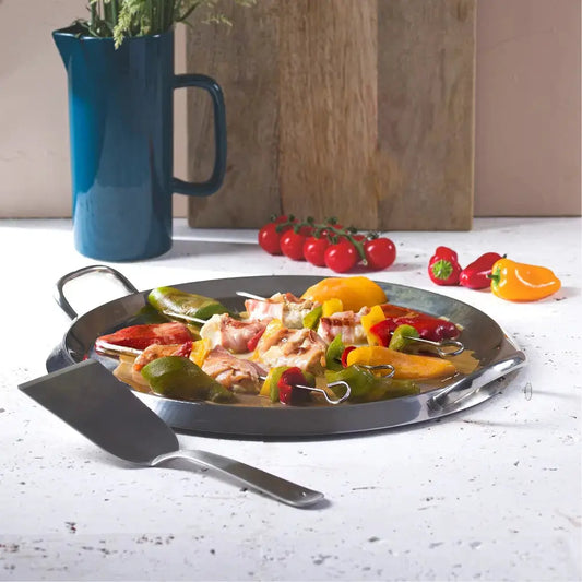 CRISTEL plancha grill with stainless lid, round stainless steel griddle with veggies on Tampa Home & Garden Store