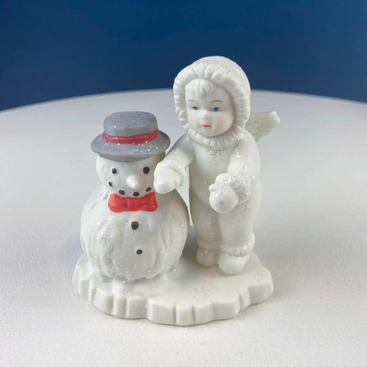 Polar Pals Cupid night light figurines: snowman with grey hat beside a cupid on snowy base on Tampa Home & Garden Store