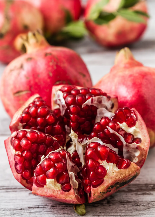 Parfianka pomegranate fruit with ruby arils, cut open to show seeds on Tampa Home & Garden Store