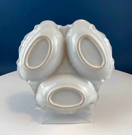 Glossy white porcelain divided bowl with three lobed sections and scalloped edges on Tampa Home & Garden Store