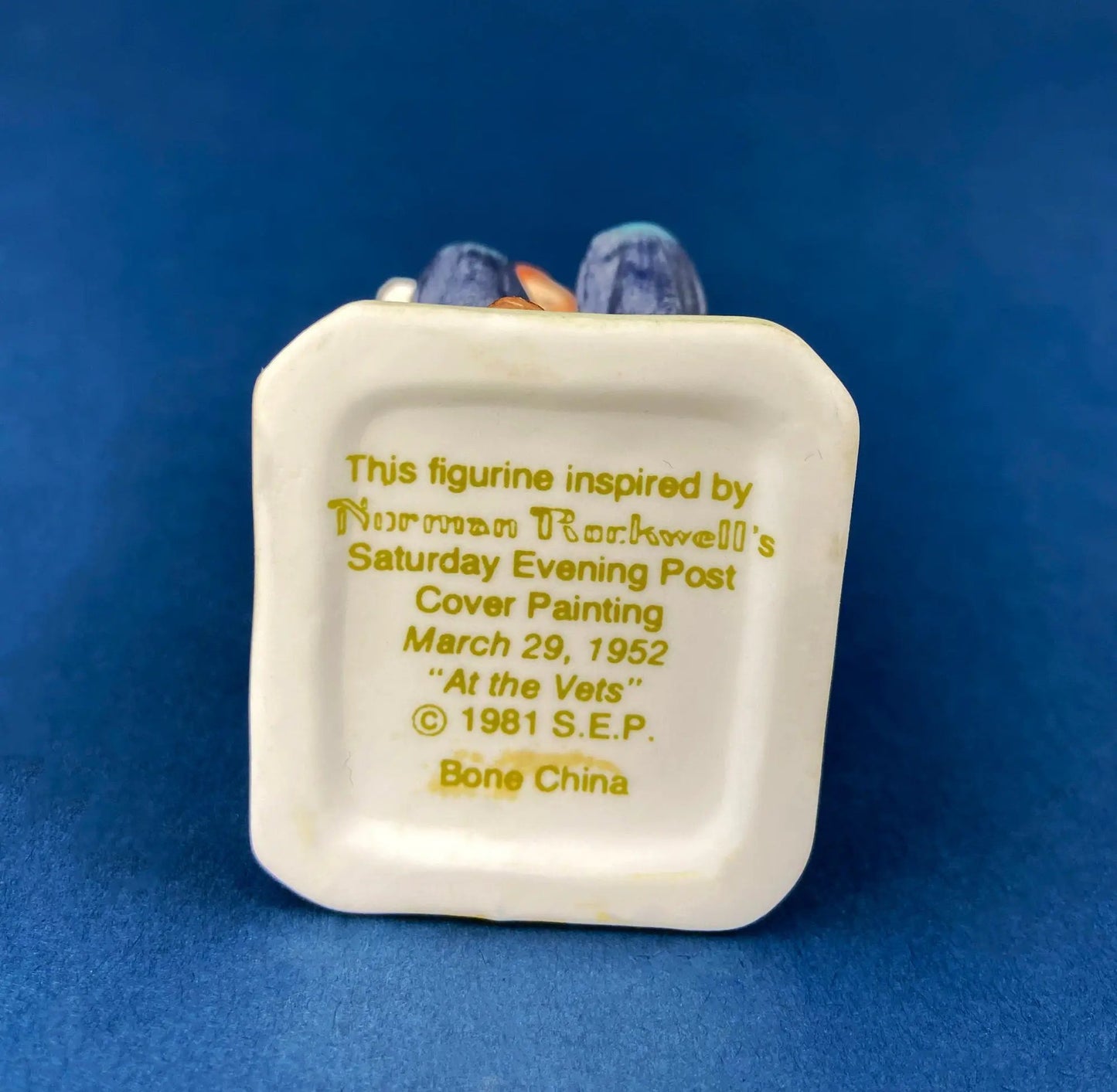 Lefton porcelain figurine - girl feeding a sick goose; base shows printed inscription on Tampa Home & Garden Store