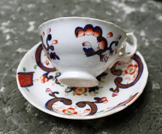 Porcelain teacup and saucer hand-painted in Japan with colorful floral pattern tea set on Tampa Home & Garden Store