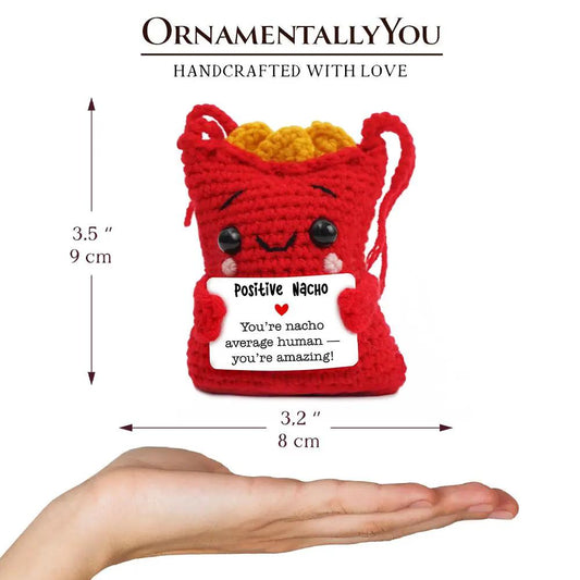 Positivity Nachos crochet doll OrnamentallyYou, red plush, orange top, holds encouragement card on Tampa Home & Garden Store