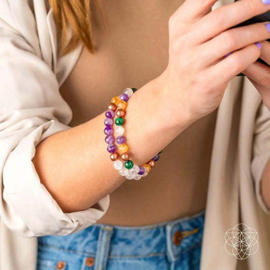 Wealth Manifestation Crystal Quartet Bracelet Set two beaded bracelets purple clear crystals on Tampa Home & Garden Store