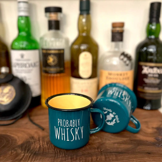 Enamel camp mug 11oz in teal with yellow interior, features the phrase Probably Whisky on Tampa Home & Garden Store