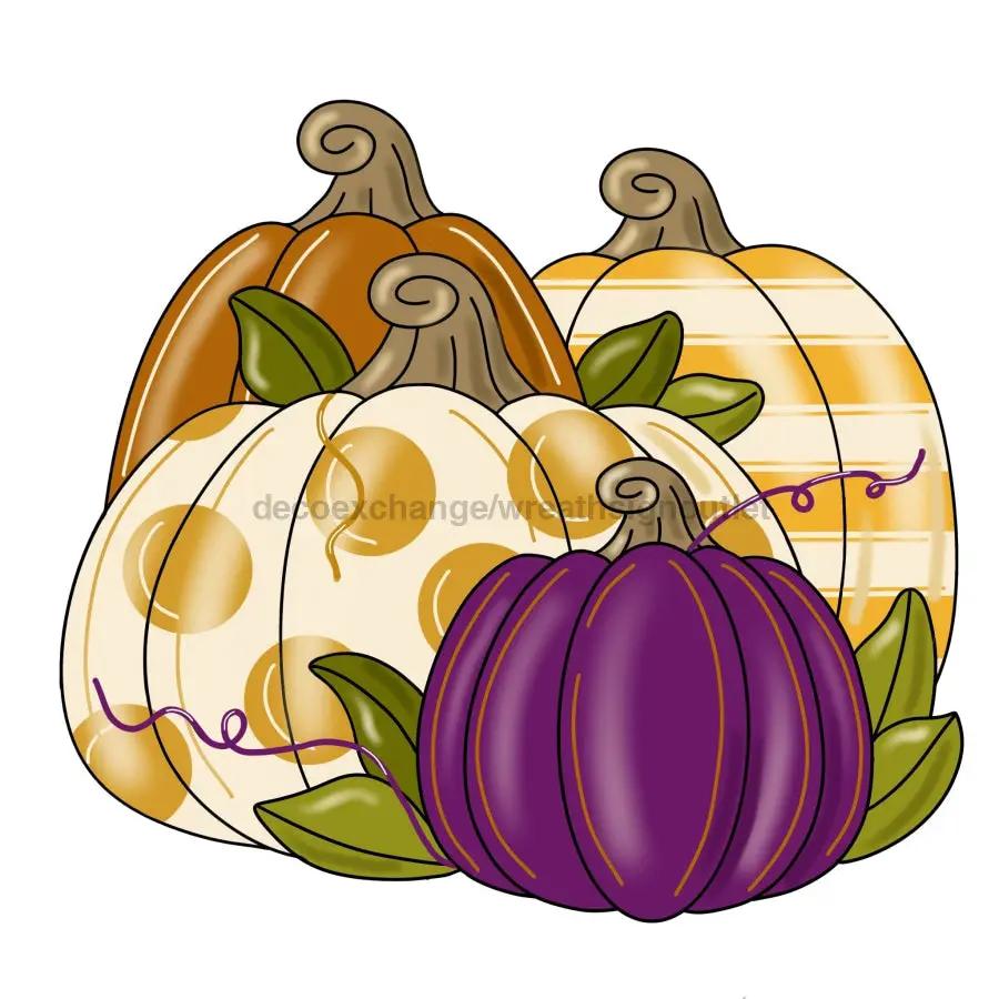 Pumpkin sign decor with orange, white with gold polka dots, and purple pumpkins DecoExchange on Tampa Home & Garden Store