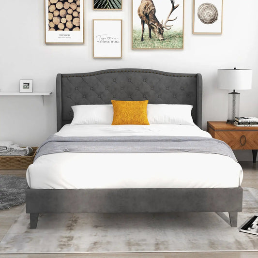 Full-queen upholstered bed with grey tufted headboard and nailhead trim, white bedding on Tampa Home & Garden Store
