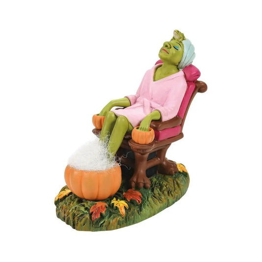 R&R Pumpkin Foot Bath figure green witch in pink robe seated in chair with pumpkin foot baths on Tampa Home & Garden Store