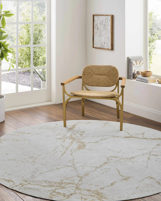 Rasia Luxe Rug Ivory Cream Tan by Boutique Rugs, round with abstract tan pattern on Tampa Home & Garden Store