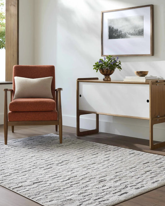 Reece Luxe Rug cream beige by Boutique Rugs with console and chair on Tampa Home & Garden Store on Tampa Home & Garden Store