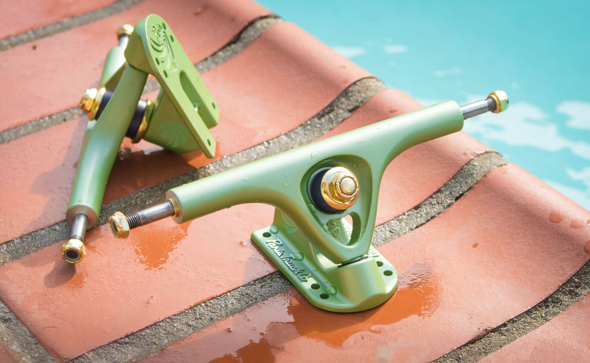 V3 180mm 50° Tropic Green longboard trucks by Paris Truck Co, green aluminum with gold hardware on Tampa Home & Garden Store