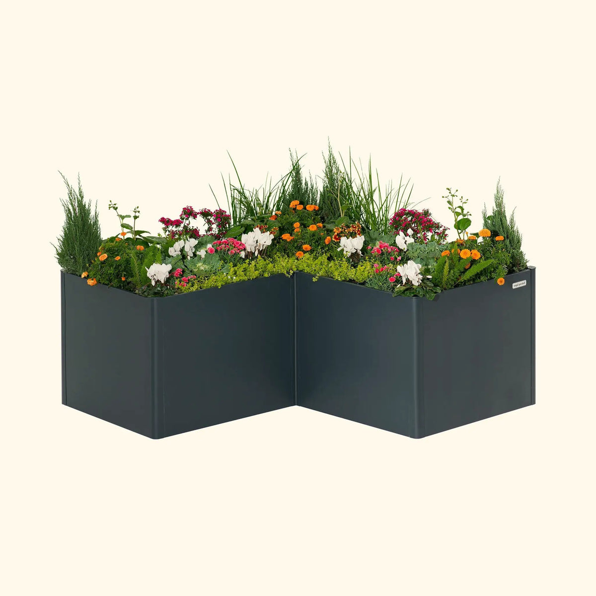 Garden bed kit Modern L-shaped raised bed in dark metal filled with colorful flowers on Tampa Home & Garden Store