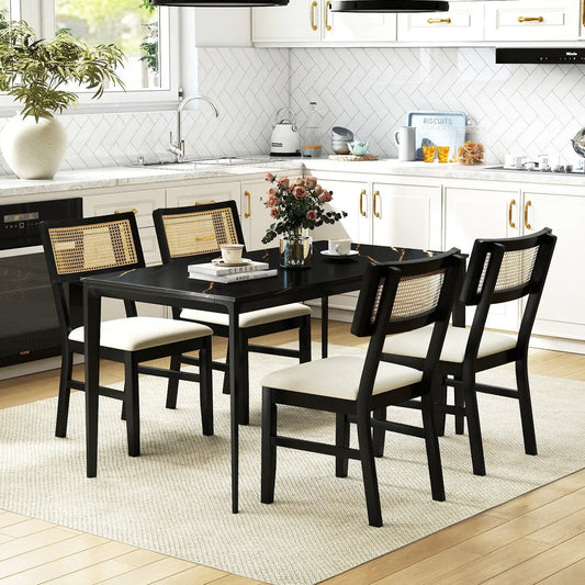 Rattan dining chairs set of 4 with black frames and cane backs, fabric seats around a black table in a white kitchen on Tampa Home & Garden Store