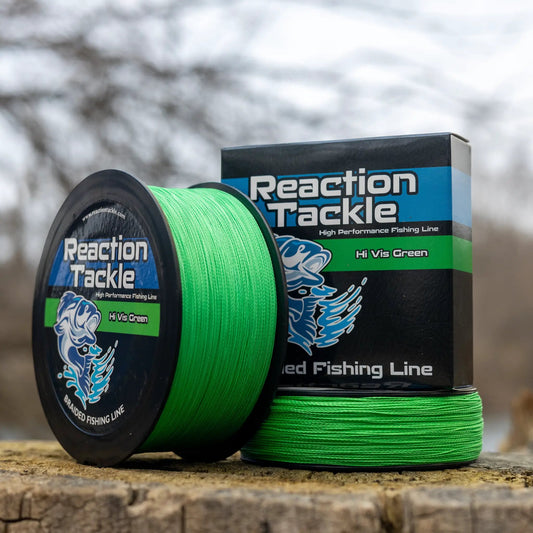 Reaction Tackle Braided Fishing Line Hi Vis Green spools beside packaging on Tampa Home & Garden Store