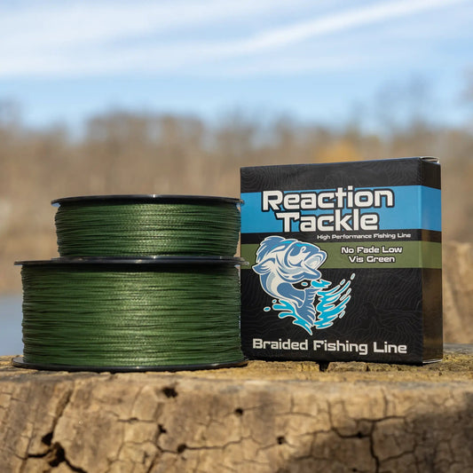 Reaction Tackle Braided Fishing Line low-vis green spool beside box on Tampa Home & Garden Store