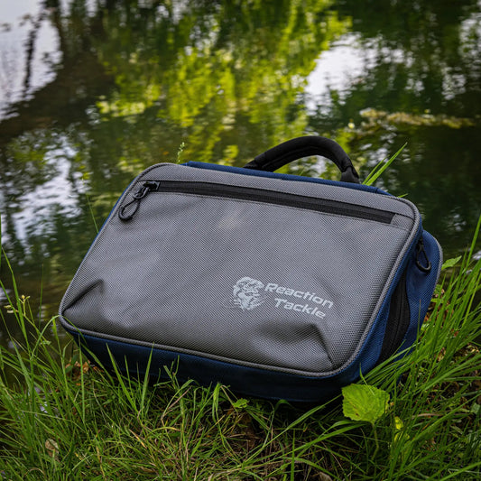 Reaction Tackle Deluxe Bait Binder and Tackle Storage bag in gray with blue trim on Tampa Home & Garden Store