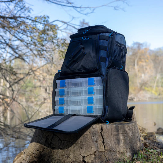 Reaction Tackle backpack with trays, black pack with blue zipper pulls and clear trays on Tampa Home & Garden Store