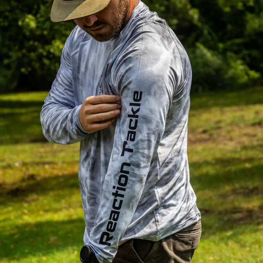 Reaction Tackle SPF UPF 50 long sleeve shirt gray tie-dye with sleeve logo on Tampa Home & Garden Store