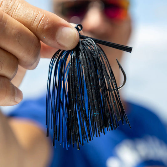 Reaction Tackle Tungsten Flipping Jigs 2-pack with black and blue skirt strands on Tampa Home & Garden Store