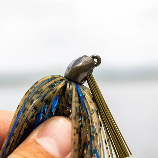 Reaction Tackle Tungsten Swim Jig olive-brown skirt with blue accents on Tampa Home & Garden Store