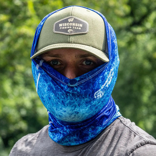 Reaction Tackle UPF 50 blue patterned neck gaiter shield worn over the face by a person on Tampa Home & Garden Store
