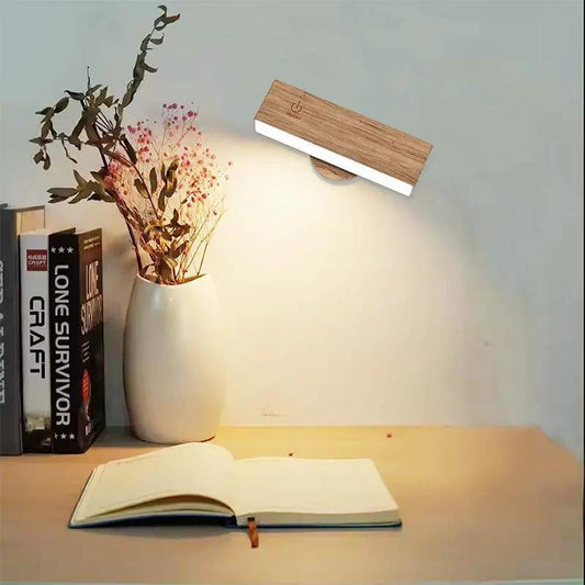 Rechargeable wood wall sconce by Moktan Sabai with remote control, warm light over desk on Tampa Home & Garden Store