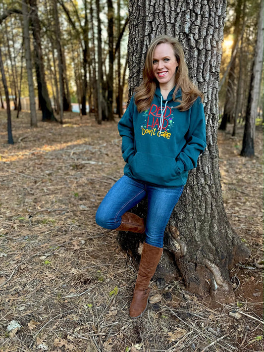 Red Hair Don't Care Scottish Thistle Hoodie in teal fleece with embroidered design on Tampa Home & Garden Store
