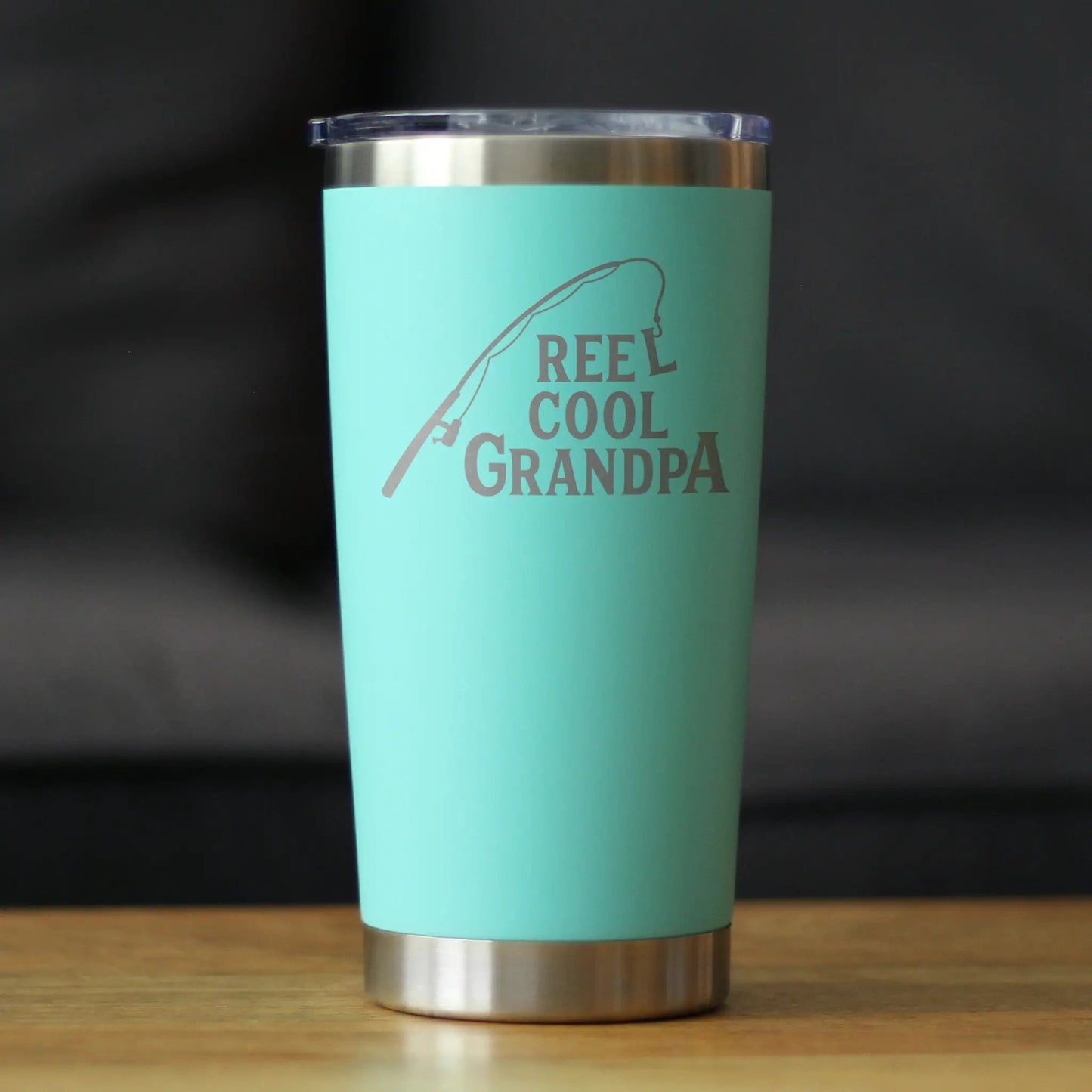 20 oz tumbler with vacuum insulation, turquoise color, Reel Cool Grandpa design by bevvee on Tampa Home & Garden Store