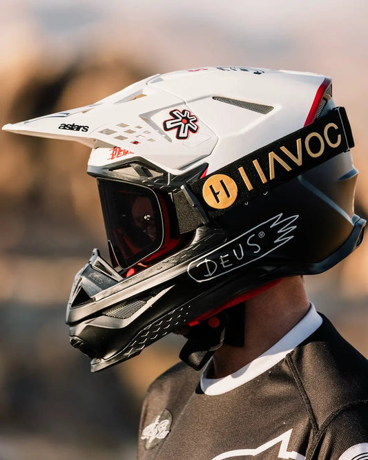 Havoc Infinity Goggles with black strap and red-tinted lenses on white helmet on Tampa Home & Garden Store