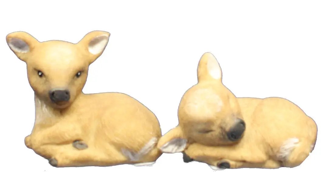 Reindeer figurines Reino and Rolf pair, tan with sleeping and awake poses on Tampa Home & Garden Store