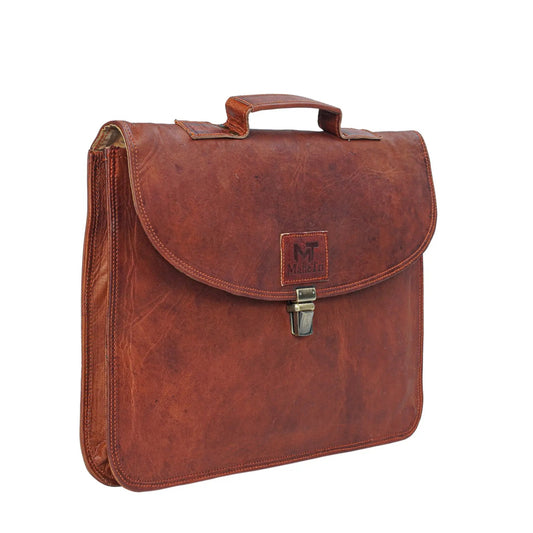 Brown leather MacBook Air 14-inch sleeve with top handle and metal latch on Tampa Home & Garden Store