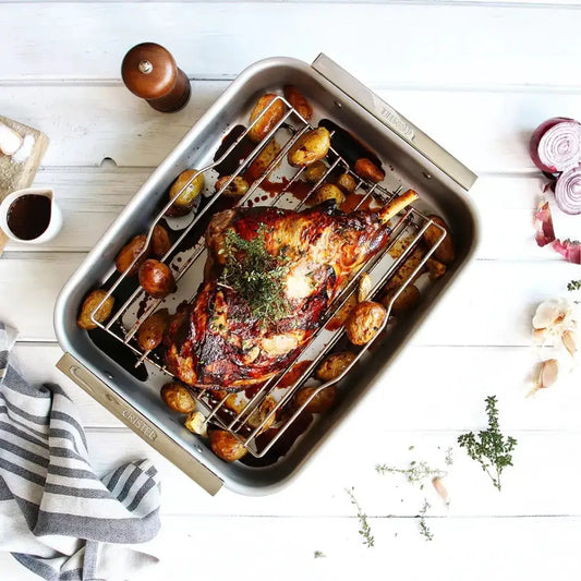 Stainless Steel Roaster with Riveted Handles and rack CRISTEL USA roasted chicken with potatoes on Tampa Home & Garden Store
