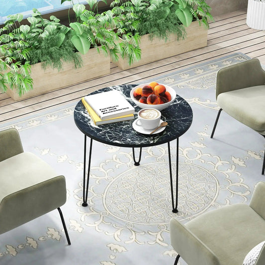 Round coffee table with thick black marble top and metal tripod legs DirectDeals on Tampa Home & Garden Store