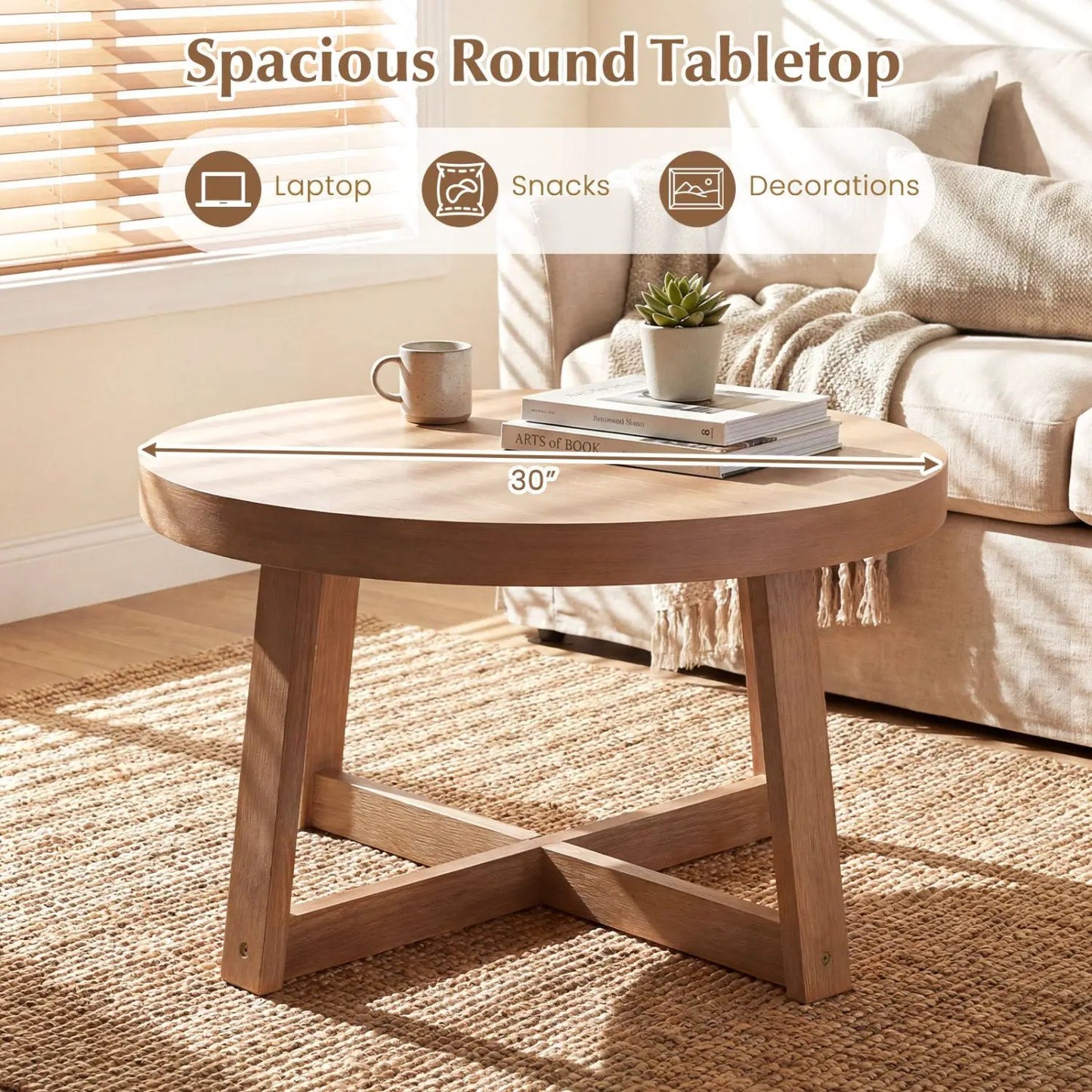 Round natural wood coffee table with cross-legged base, 30 inch diameter in living room on Tampa Home & Garden Store