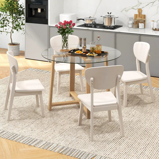 Round glass dining table 42-inch with natural rubber wood legs and four white chairs on Tampa Home & Garden Store