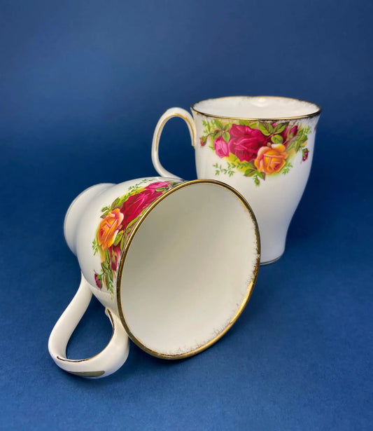 Three Royal Albert Old Country Roses mugs with gold rims and vivid rose pattern on ceramic on Tampa Home & Garden Store