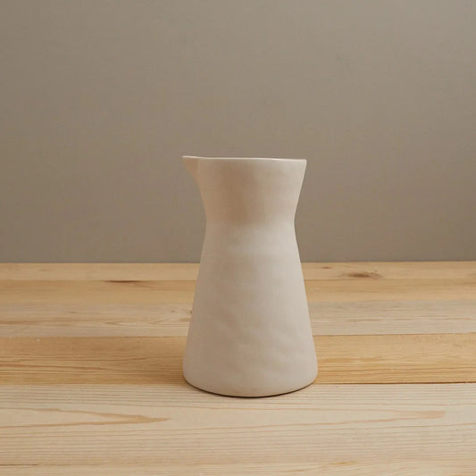 Rugueux stoneware carafe pitcher pearl finish on a wooden table on Tampa Home & Garden Store