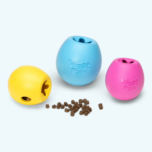 Rumbl Puzzle Toy for Dogs; three treat-dispensing balls in blue, yellow, pink (West Paw) on Tampa Home & Garden Store