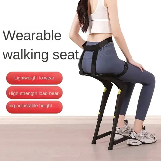 Wearable exoskeleton folding chair by Moktan Sabai with black frame and yellow accents on Tampa Home & Garden Store