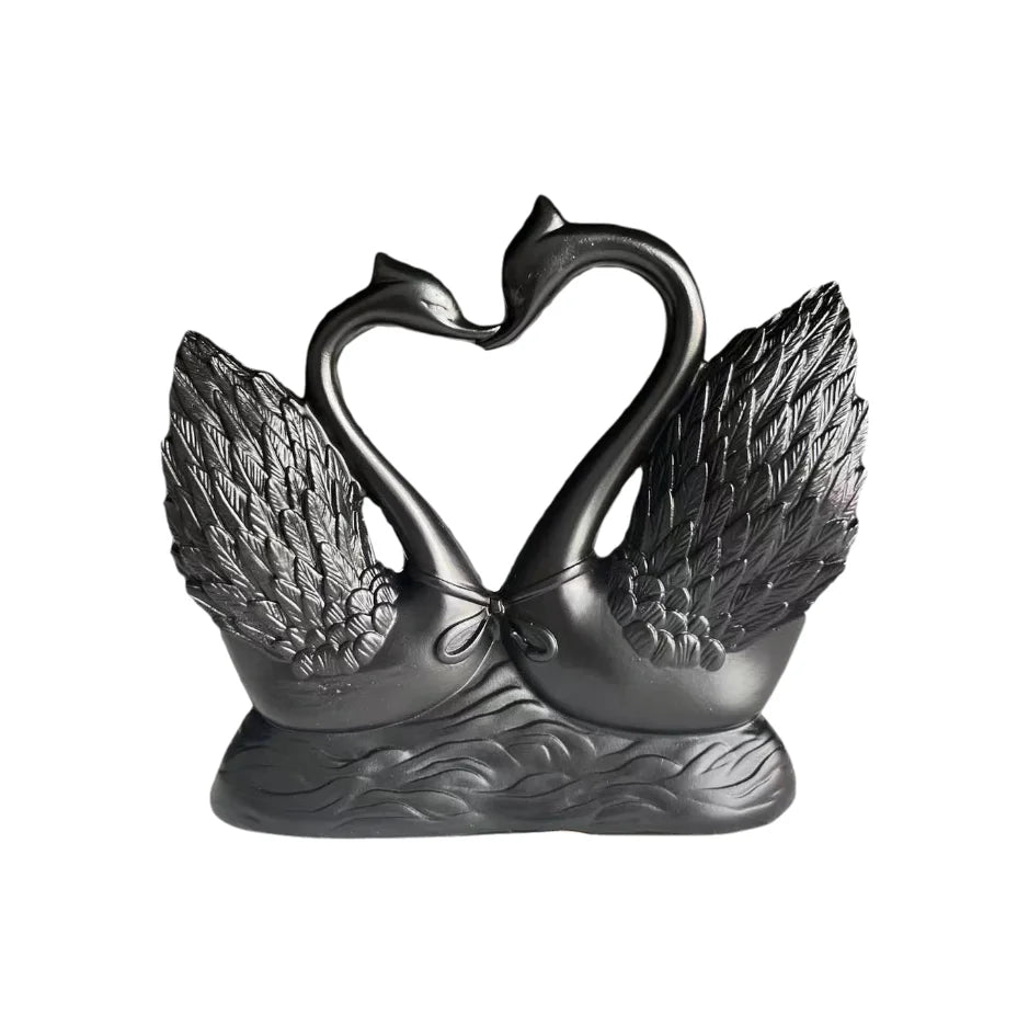Heart-to-heart swan statue: black couple sculpture with detailed wings on a water base on Tampa Home & Garden Store