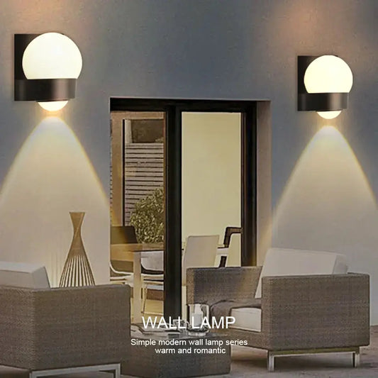 IP66 Waterproof LED Wall Light 8W, pair of black metal fixtures with round white glass globes on Tampa Home & Garden Store