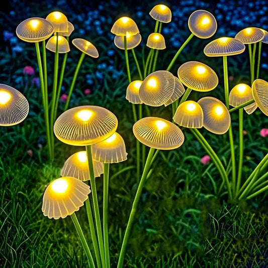 Solar Jellyfish Lights Outdoor Mushroom Garden with yellow glowing mushroom caps on stems on Tampa Home & Garden Store