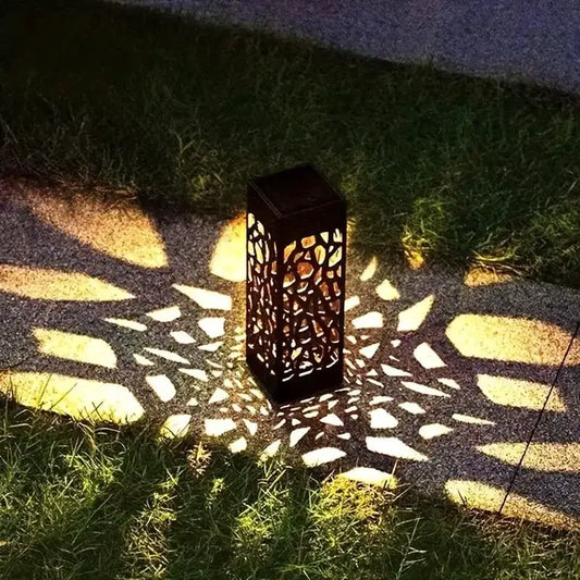 Solar Garden Stake Light Moktan Sabai, metal lattice casting shadows for landscape lighting on Tampa Home & Garden Store