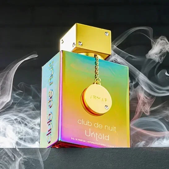 Armaf Club de Nuit Untold EDP perfume bottle with gold cap pendant on iridescent gradient box on Tampa Home & Garden Store