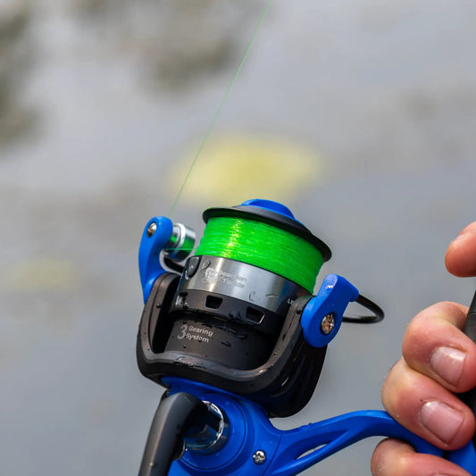 Predator Pro spinning rod and reel by Reaction Tackle reel with neon green line close up on Tampa Home & Garden Store